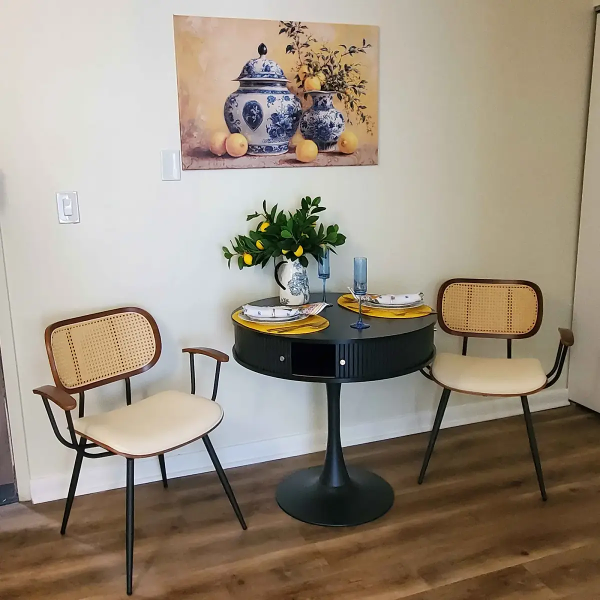 Curated dining nook with chinoiserie accents and tailored seating — designed by Renata Glaz